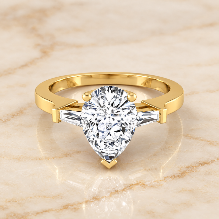 The June Three Stone Pear Engagement Ring Setting in 18K Yellow Gold