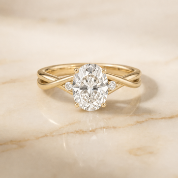 The Dusty Hidden Halo Solitaire Oval Engagement Ring Setting in 18K Yellow Gold