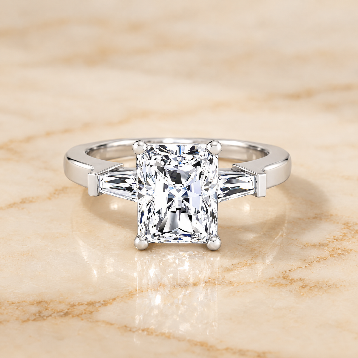 The June Three Stone Radiant Cut Engagement Ring Setting in Platinum