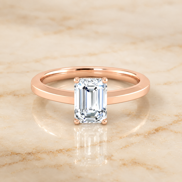 The Carmen Beveled Edge Comfort Fit Solitaire Emerald Cut Engagement Ring Setting in 14K Rose Gold