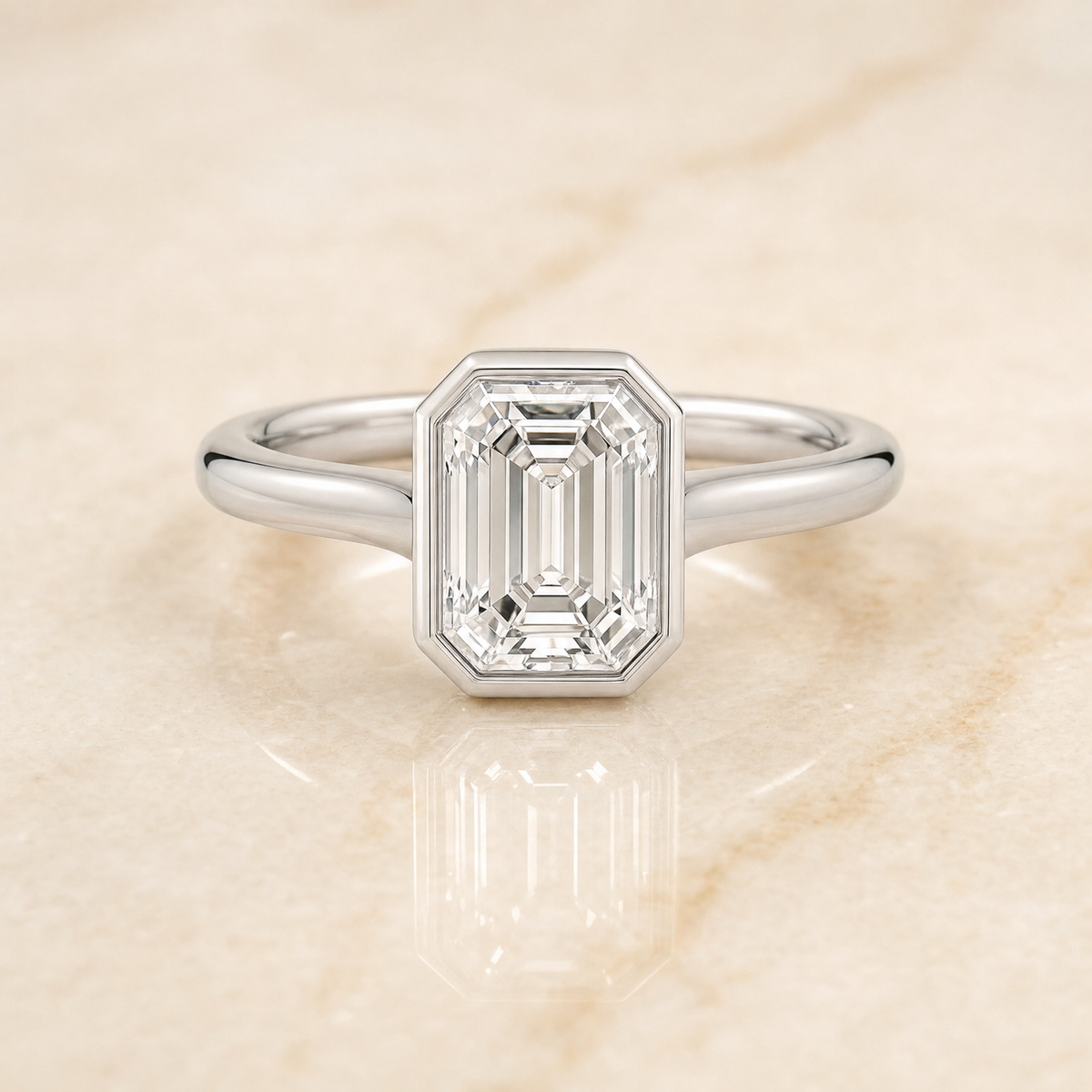 The Duran Simple Bezel Solitaire Emerald Cut Engagement Ring Setting in Platinum