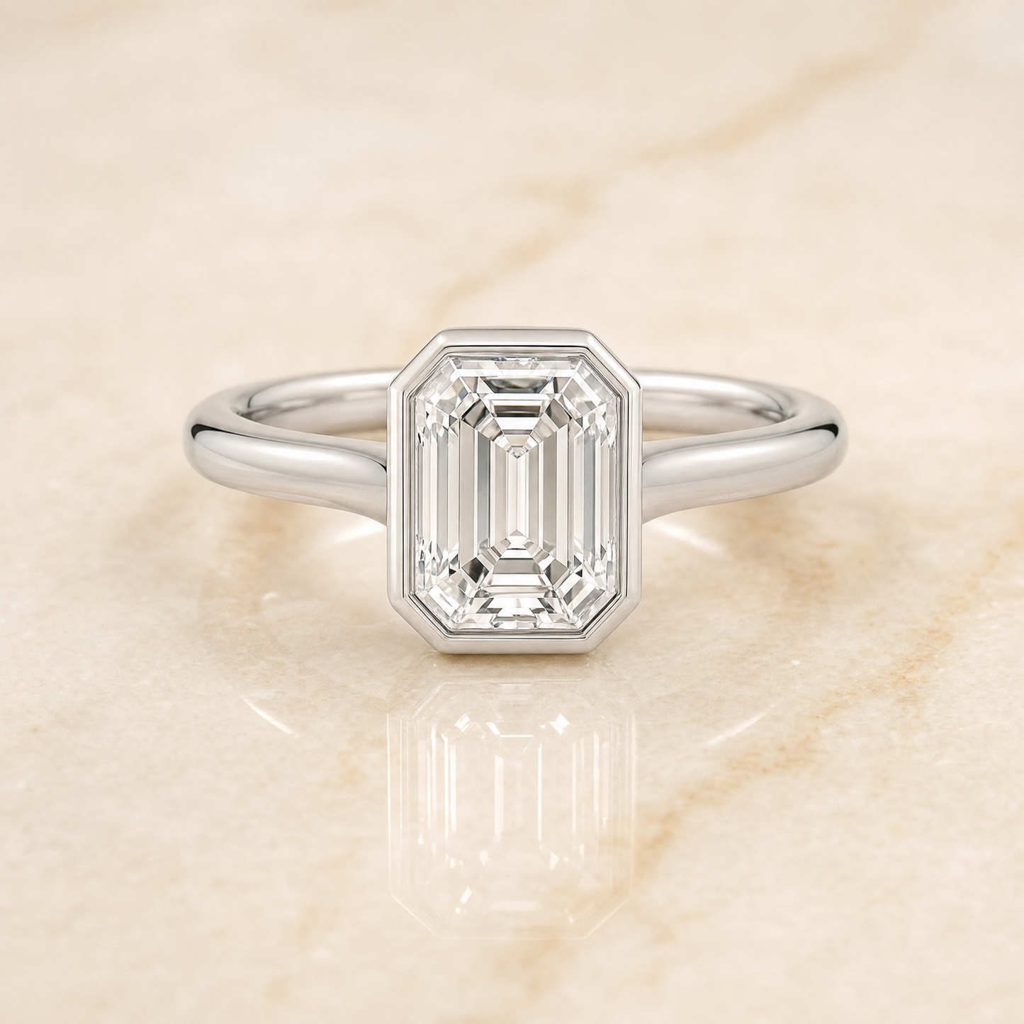 The Duran Simple Bezel Solitaire Emerald Cut Engagement Ring Setting in Platinum