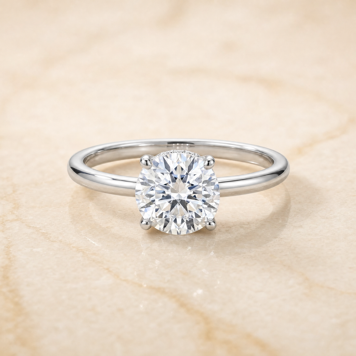 The Joni Hidden Halo Solitaire Round Engagement Ring Setting in 18K White Gold
