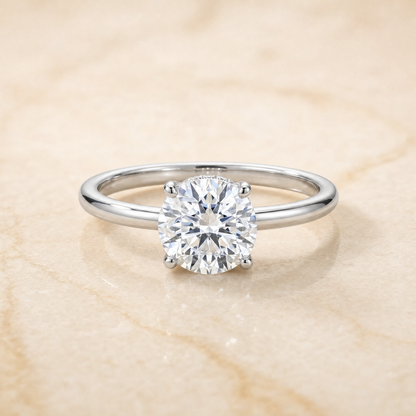 The Joni Hidden Halo Solitaire Round Engagement Ring Setting in 18K White Gold