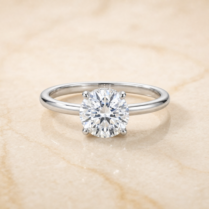 The Joni Hidden Halo Solitaire Round Engagement Ring Setting in 18K White Gold