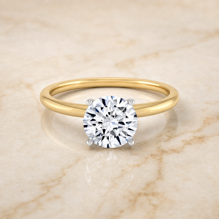 The Joni Hidden Halo Solitaire Round Engagement Ring Setting in 18K Yellow Gold