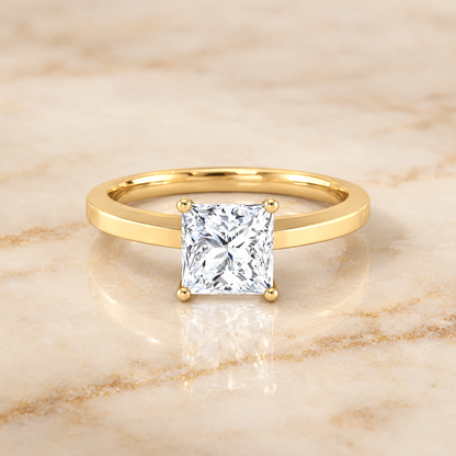 The Carmen Beveled Edge Comfort Fit Solitaire Princess Cut Engagement Ring Setting in 18K Yellow Gold