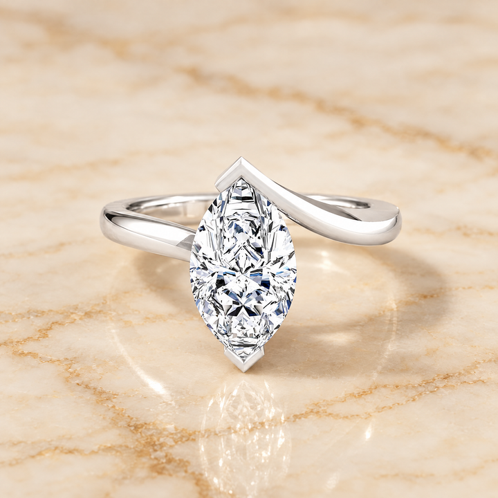 The Julia Bezel Tension Set Solitaire Marquise Engagement Ring Setting in Platinum