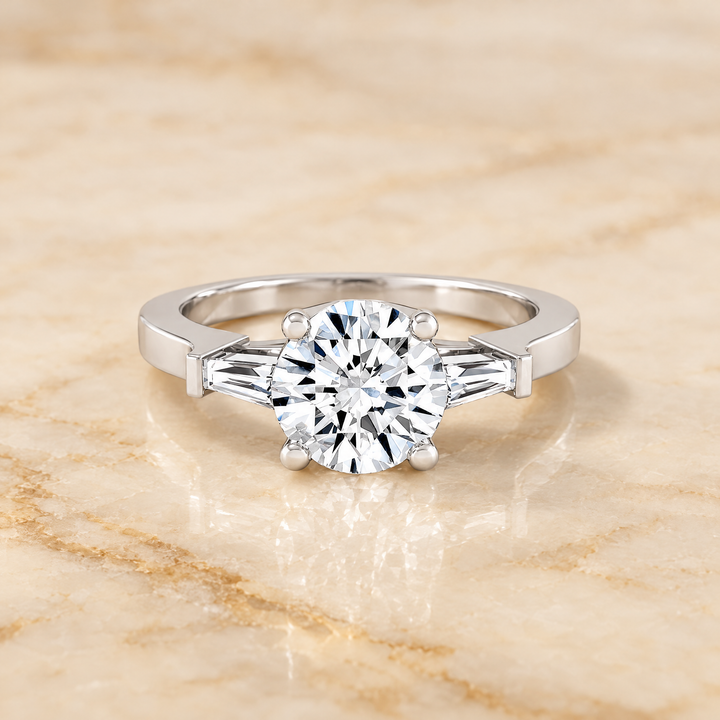 The June Three Stone Round Engagement Ring Setting in Platinum