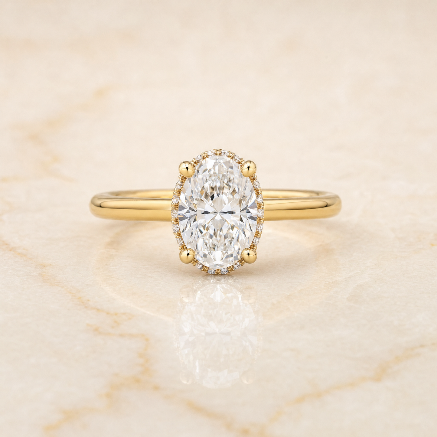 The Lana Secret Halo Adorned Prong Solitaire Oval Engagement Ring Setting in 18K Yellow Gold