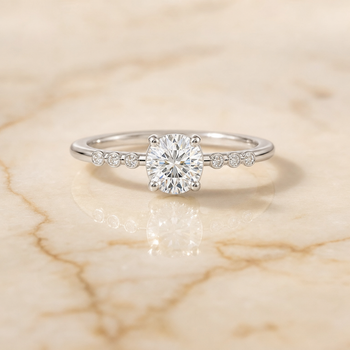 The Peggy Bezel Accent Solitaire Round Engagement Ring Setting in Platinum