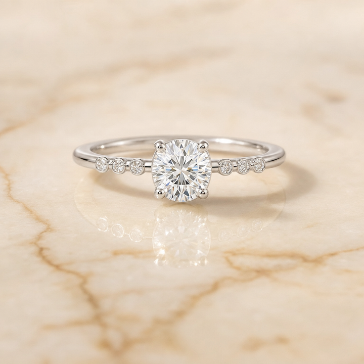 The Peggy Bezel Accent Solitaire Round Engagement Ring Setting in Platinum