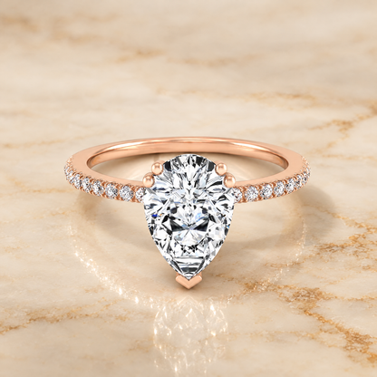 Pear engagement ring setting in 14K Rose Gold, Kelly Double Claw Prong French Pavé Pear | RockHer