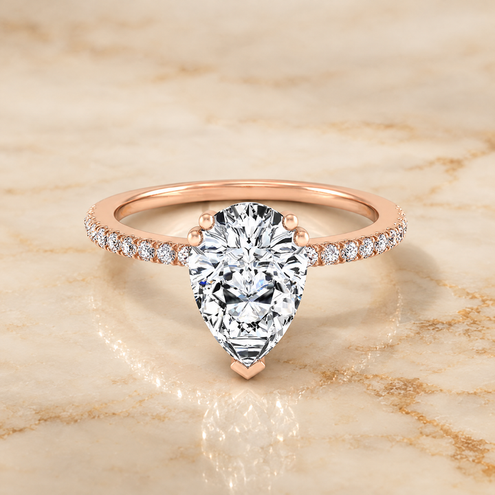 Pear engagement ring setting in 14K Rose Gold, Kelly Double Claw Prong French Pavé Pear | RockHer