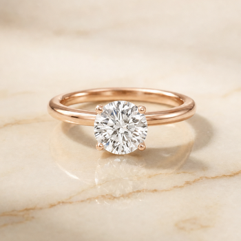The Lana Secret Halo Adorned Prong Solitaire Round Engagement Ring Setting in 14K Rose Gold