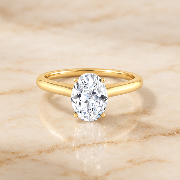 The Rosanna Cathedral Surprise Stone Solitaire Oval Engagement Ring Setting in 18K Yellow Gold