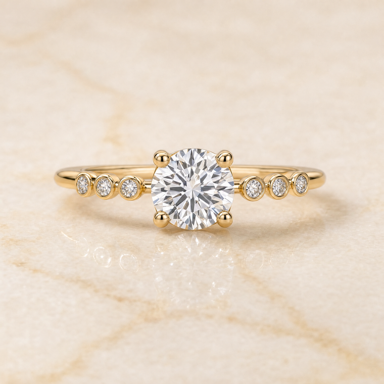 The Peggy Bezel Accent Solitaire Round Engagement Ring Setting in 18K Yellow Gold