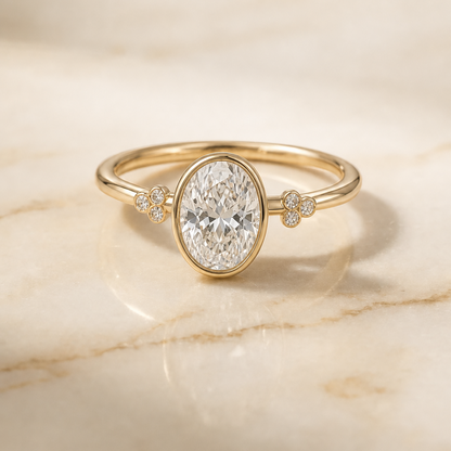 The Selena Clover Bezel Accent Solitaire Oval Engagement Ring Setting in 18K Yellow Gold