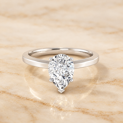 The Carmen Beveled Edge Comfort Fit Solitaire Pear Engagement Ring Setting in 18K White Gold