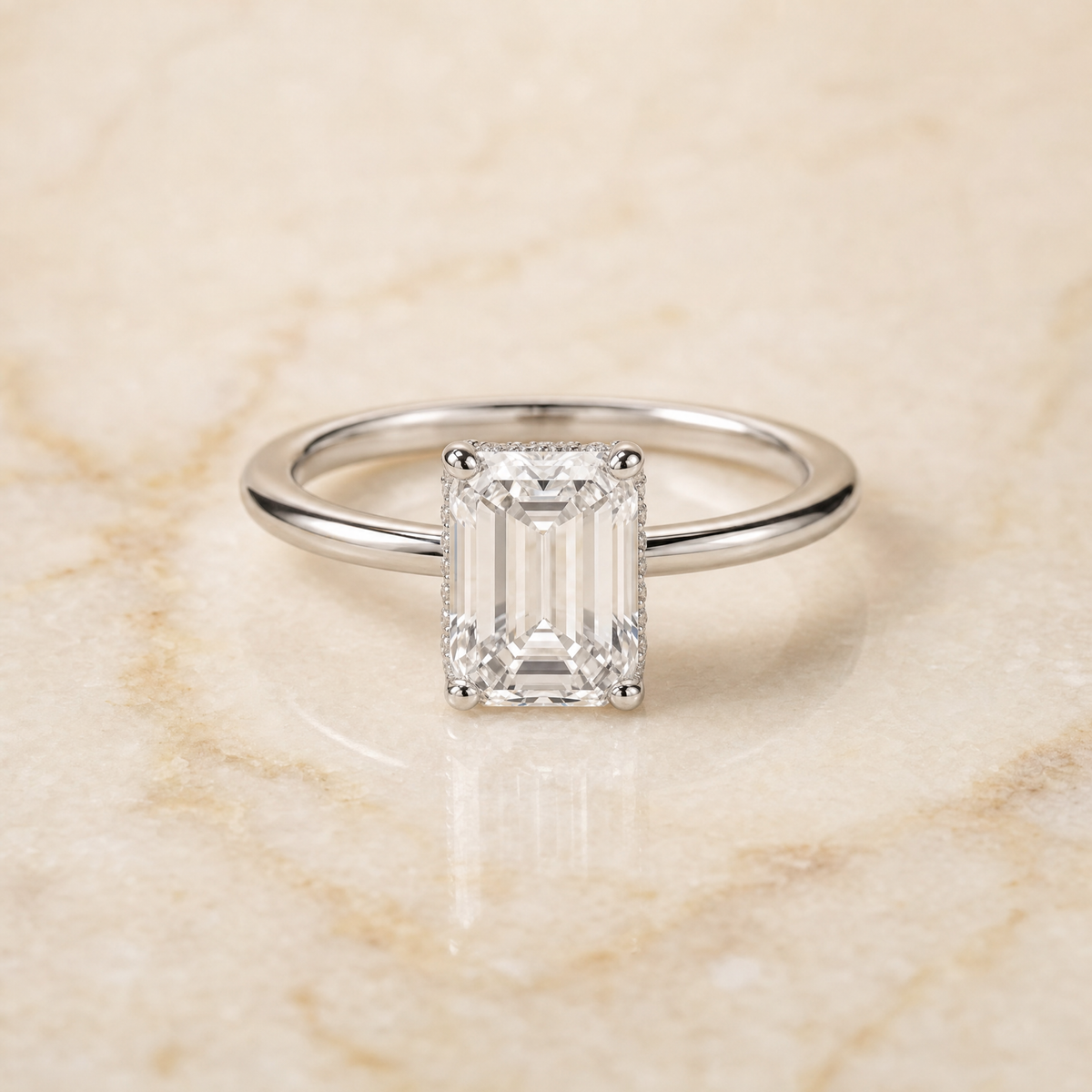 The Eartha Upper Hidden Halo Solitaire Emerald Cut Engagement Ring Setting in 18K White Gold