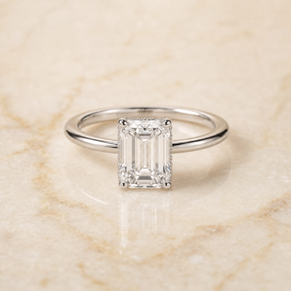 The Eartha Upper Hidden Halo Solitaire Emerald Cut Engagement Ring Setting in 18K White Gold