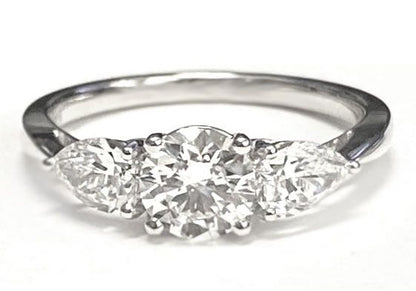 Round Brilliant, Three Stone Matched Shape, in 14K Rose Gold, prong setting – lifestyle shot | RockHer