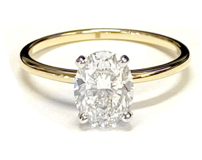 Round Comfort Fit Claw Prong Solitaire Oval, in 18K White Gold – lifestyle shot | RockHer