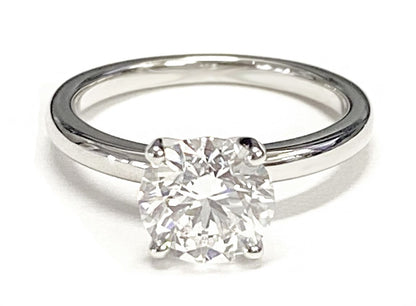 Round Brilliant, Round Comfort Fit Claw Prong Solitaire, in 18K Yellow Gold – lifestyle shot | RockHer