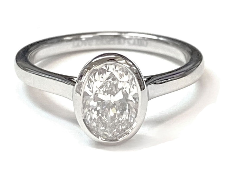 Duran Select Simple Bezel Solitaire Oval Lab Diamond Engagement Ring in 18K White Gold | RockHer