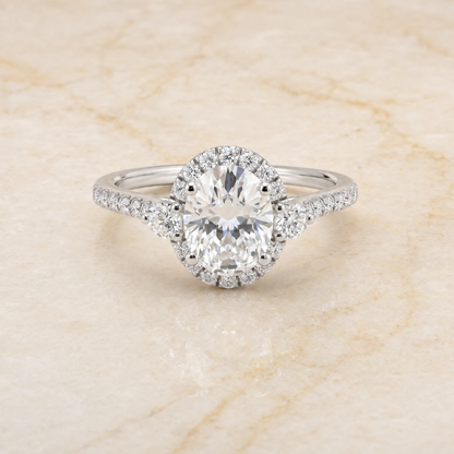 The Ivy Three Stone Delicate Halo Oval Engagement Ring Setting in 18K White Gold