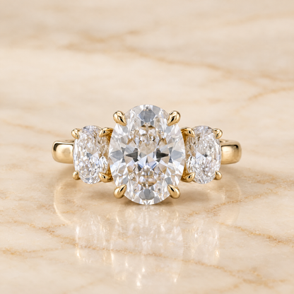Round engagement ring setting in 18K Yellow Gold, Avery Channel Pavé Three Stone Round | RockHer