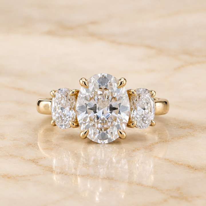 Round engagement ring setting in 18K Yellow Gold, Avery Channel Pavé Three Stone Round | RockHer