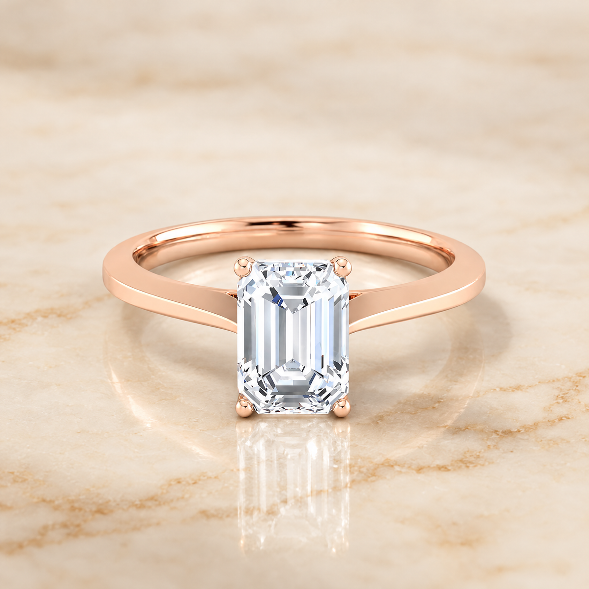 The Elena Timeless Graduated Beveled Shank Solitaire Emerald Cut Engagement Ring Setting in 14K Rose Gold