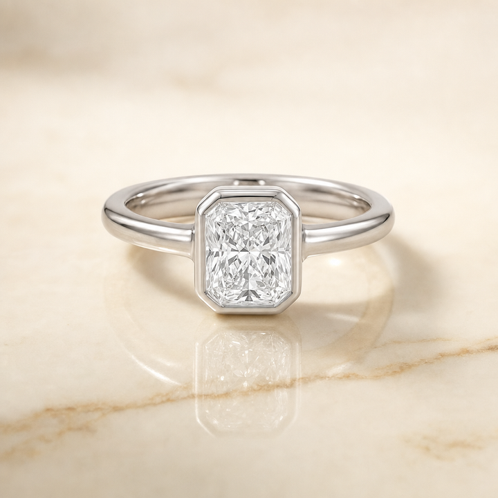 The Agnes Square Bezel Solitaire In Step Engagement Ring Setting in Platinum