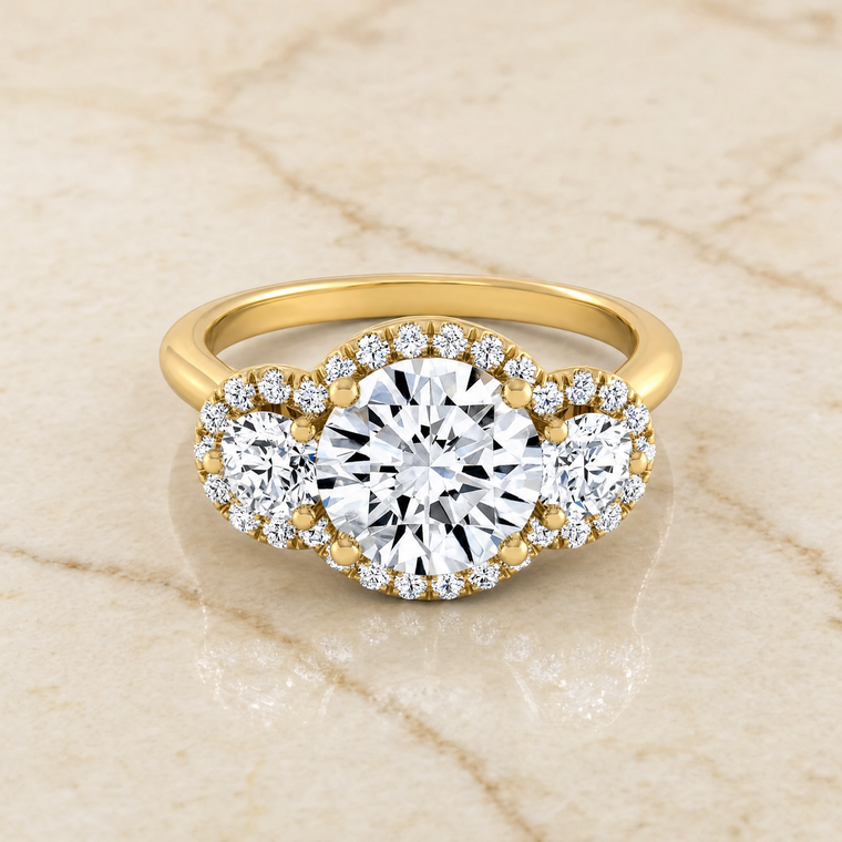 The Anna Three Stone Halo Round Engagement Ring Setting in 18K Yellow Gold