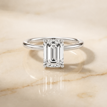 The Dolly Double Hidden Halo Solitaire Emerald Cut Engagement Ring Setting in 18K White Gold