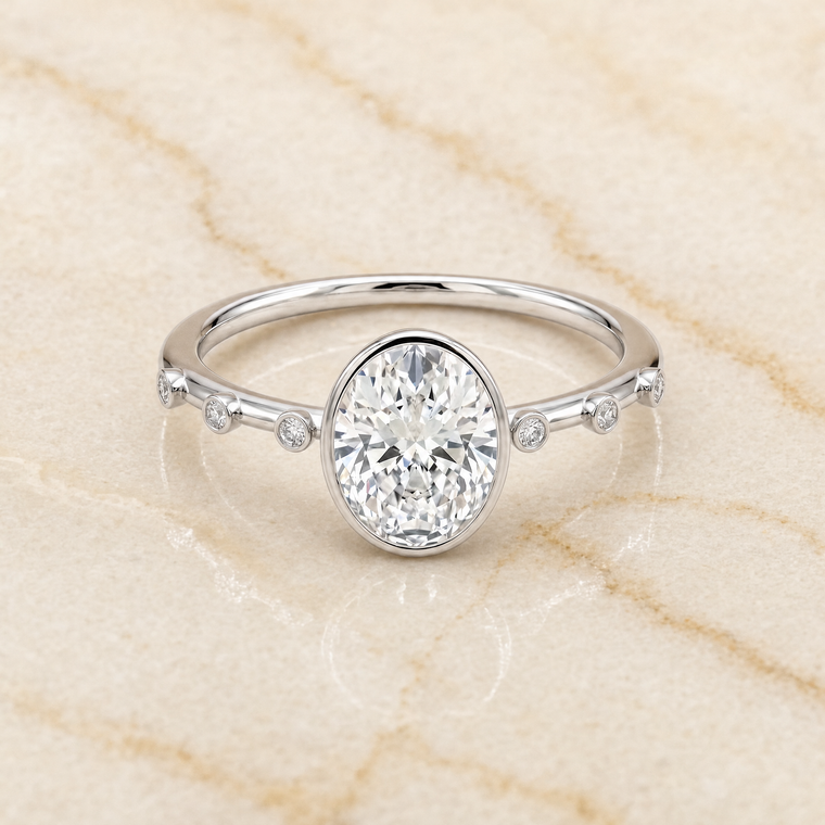 The Brandi Bezel Accent Solitaire Oval Engagement Ring Setting in Platinum