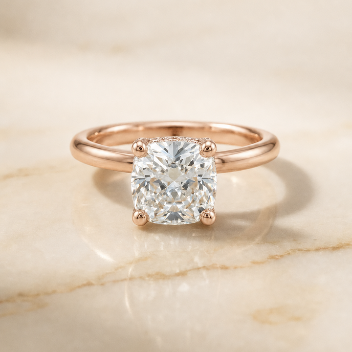 The Lana Secret Halo Adorned Prong Solitaire Cushion Cut Engagement Ring Setting in 14K Rose Gold