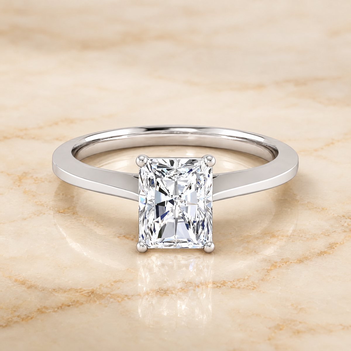 The Elena Timeless Graduated Beveled Shank Solitaire Radiant Cut Engagement Ring Setting in Platinum