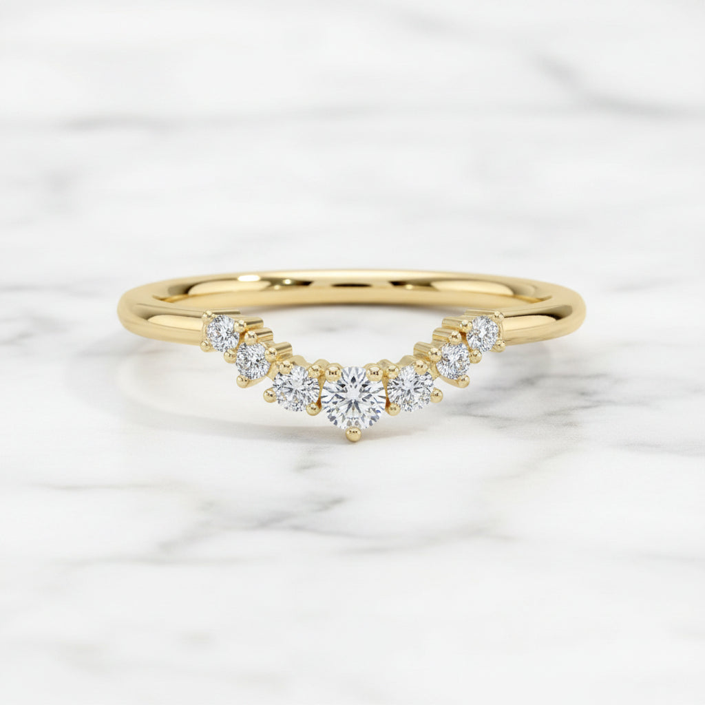 Custom contoured diamond wedding band in 18K yellow gold, graduated natural diamonds, top view