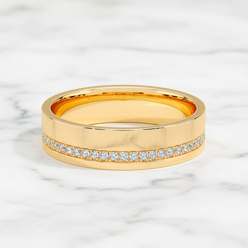 Custom men's 5.5mm half pave diamond wedding band in 18K yellow gold, top view
