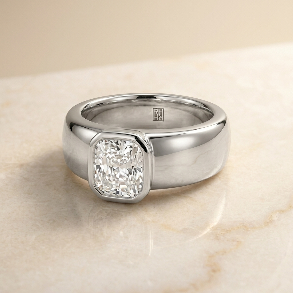 Bezel Set Cigar Band Cut styling on The Remi cushion engagement ring setting | RockHer