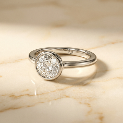 The Agnes bezel solitaire old european cut engagement ring setting in platinum — alt-angle hero — RockHer