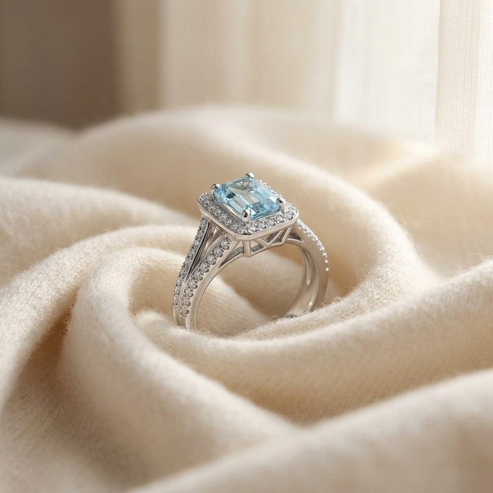 Aquamarine & Diamond Halo Ring in 18K White Gold - flat lay