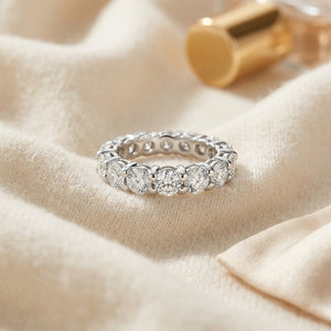 Round Diamond Eternity Band S:7.25 in 18K White Gold - flat lay