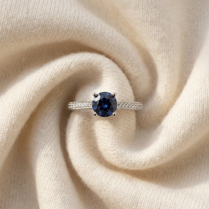 Sapphire & Micro Pave Diamond Ring in 18K White Gold - flat lay