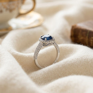 Sapphire Round & Diamond Ring in 18K White Gold - flat lay