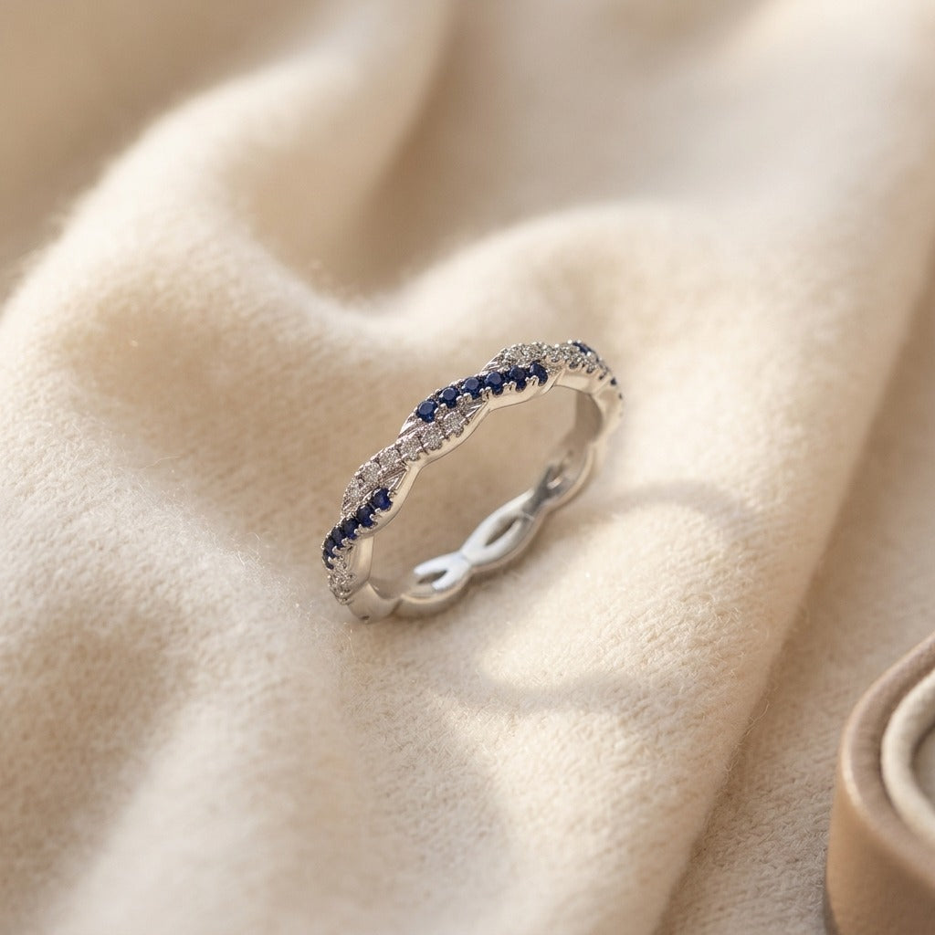 Sapphire & Diamond Twist Eternity Band in 18K White Gold - flat lay