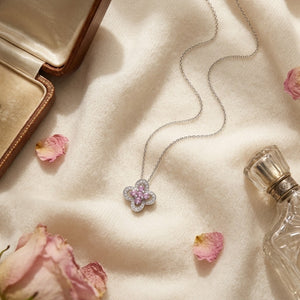 Pink Sapphire & Diamond Four-Petal Floral Necklace in 18K White Gold - flat lay