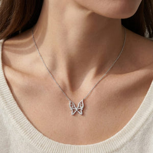 Diamond Floating Butterfly Necklace in 18K White Gold (0.10 Ct.tw), worn close-up portrait